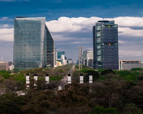 A modern commercial district building architectural detail along Paseo de la Reforma avenue in Mexico City